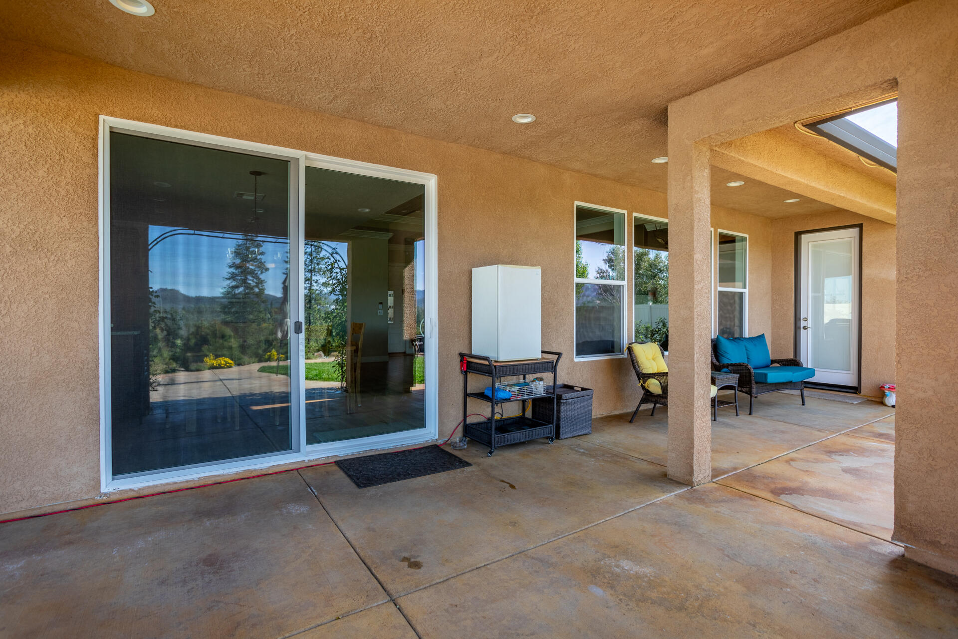 4321 Risstay Way Shasta Lake, CA 96019 - Photo 27 of 38 a view of living room with furniture and floor to ceiling window