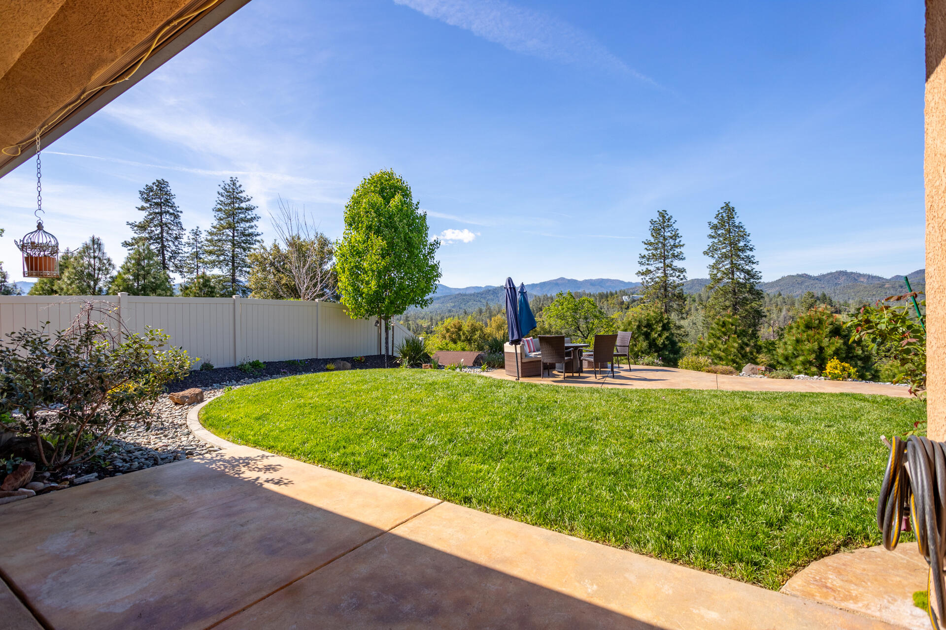 4321 Risstay Way Shasta Lake, CA 96019 - Photo 29 of 38 a view of a backyard with plants and a garden