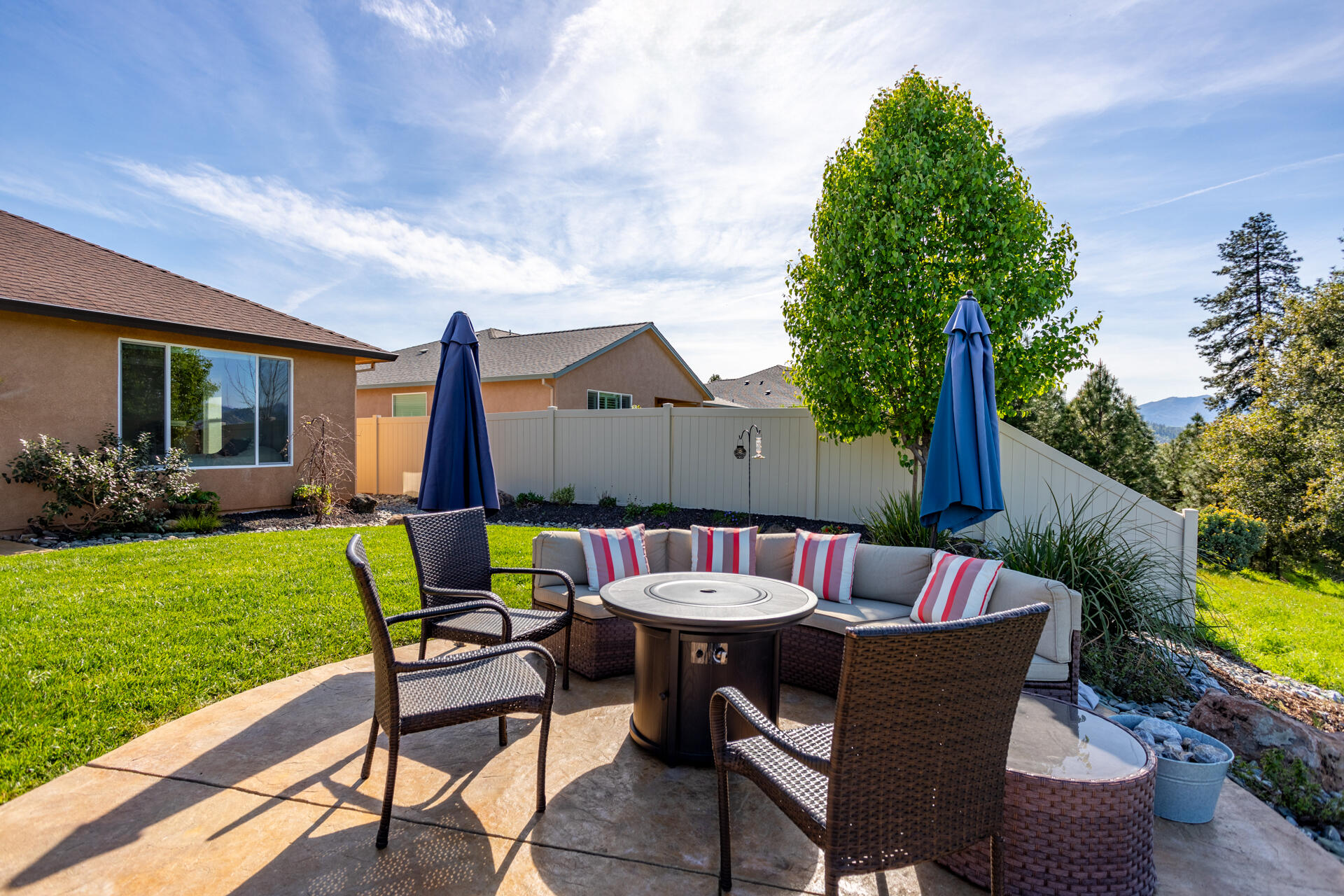 4321 Risstay Way Shasta Lake, CA 96019 - Photo 32 of 38 a view of a patio with furniture and a yard