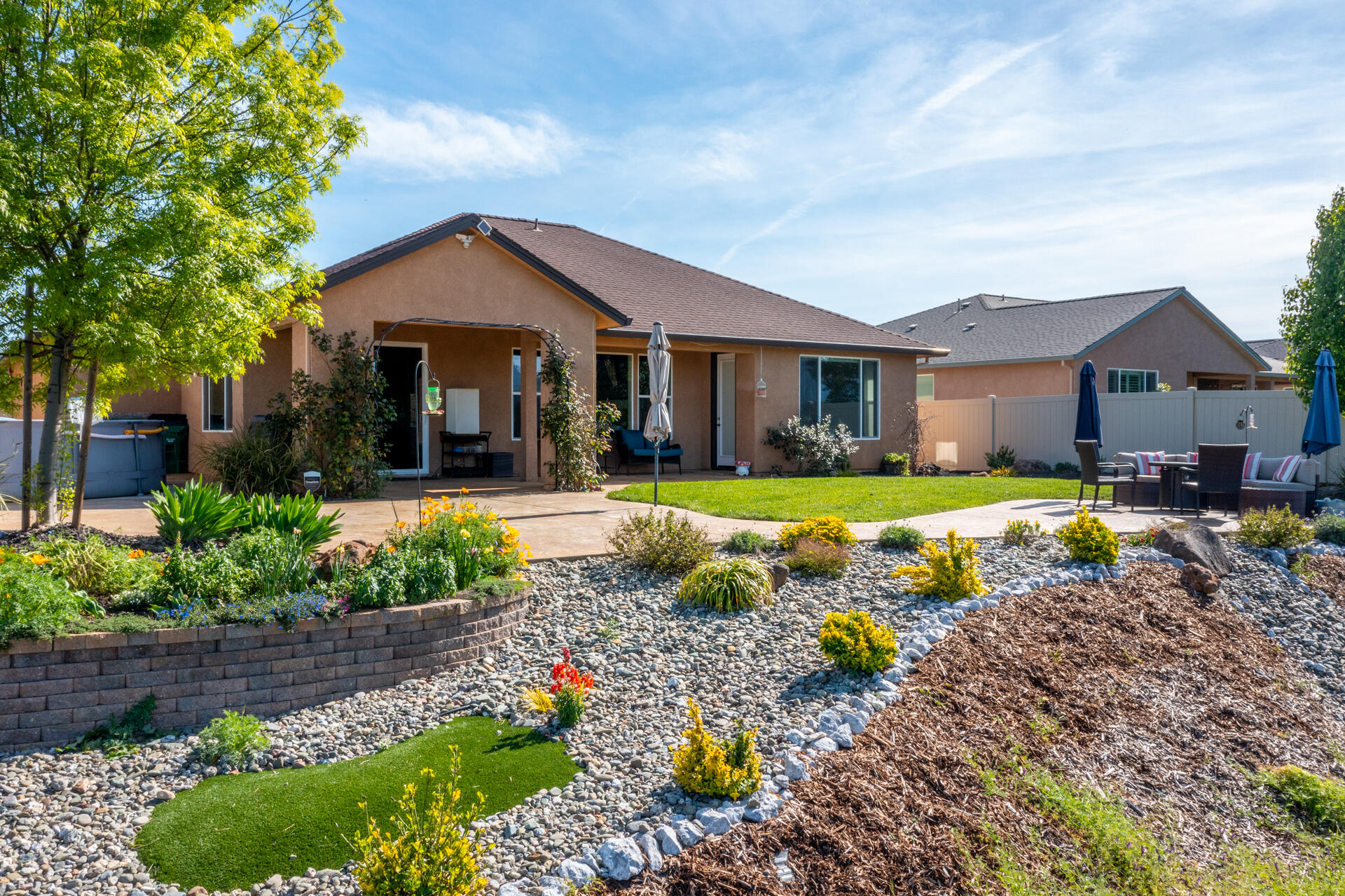 4321 Risstay Way Shasta Lake, CA 96019 - Photo 33 of 38 a view of a house with swimming pool and a yard