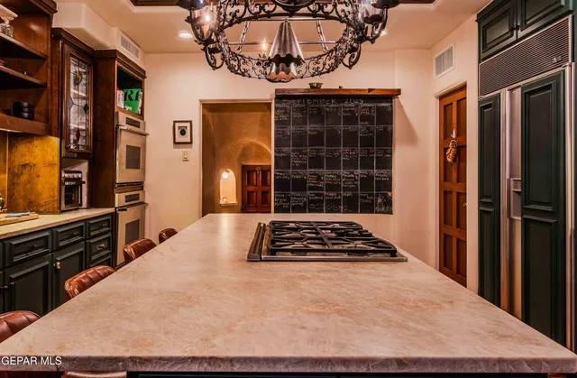 a view of a kitchen with a window