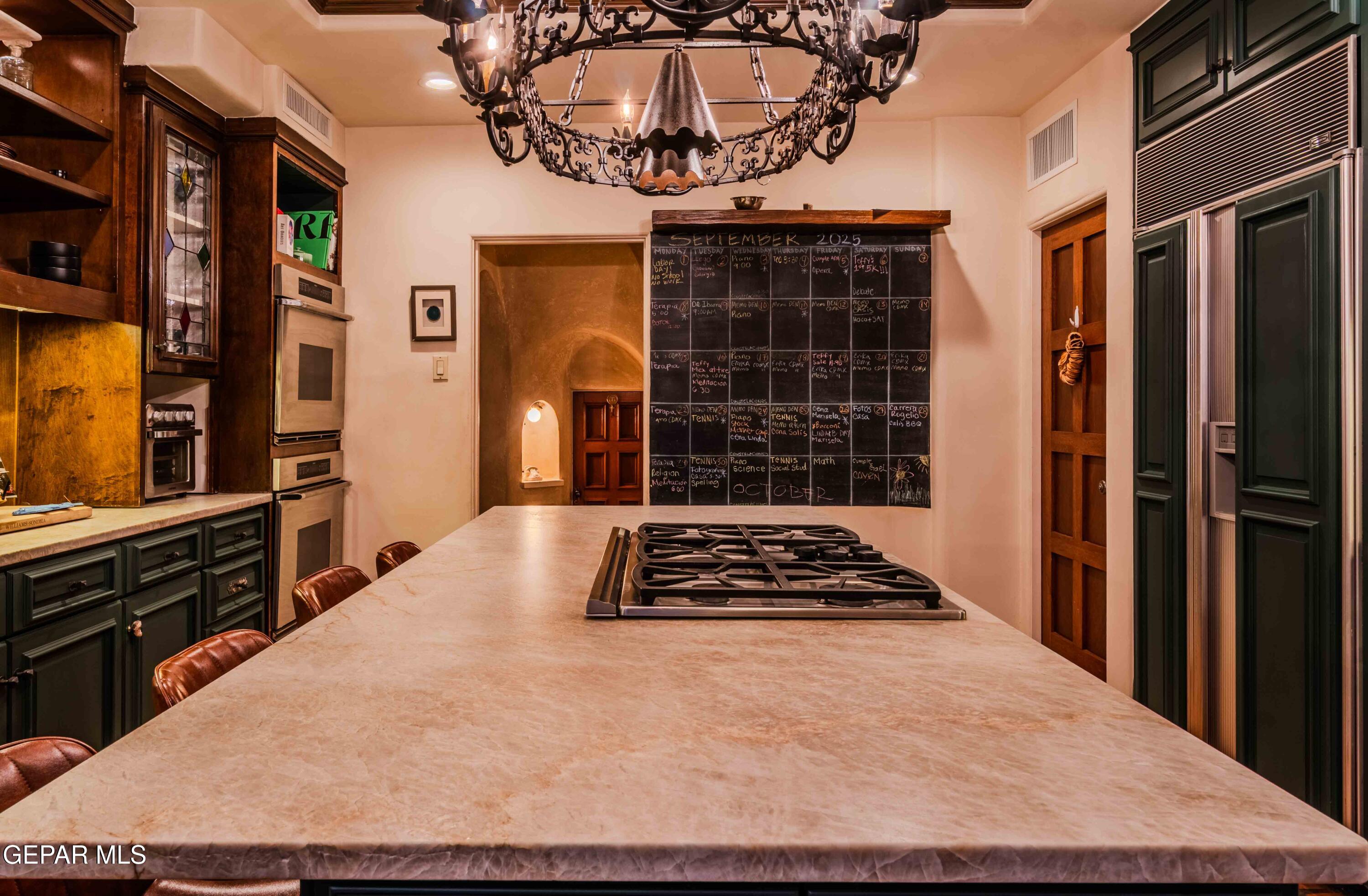 701 Rim Road El Paso, TX 79968 - Photo 18 of 54 a view of a kitchen with a window