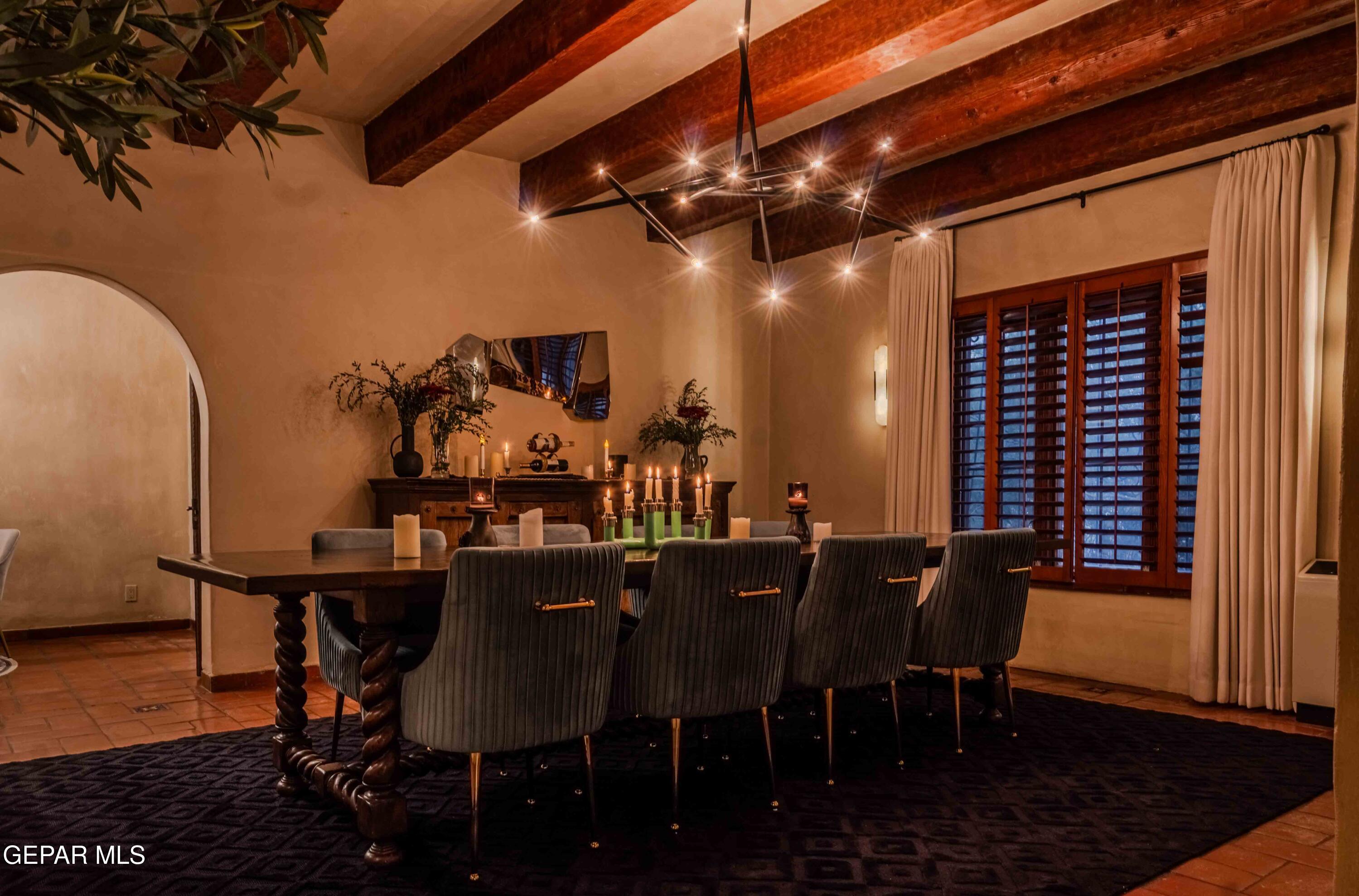 701 Rim Road El Paso, TX 79968 - Photo 23 of 54 a view of a dining room with furniture and wooden floor