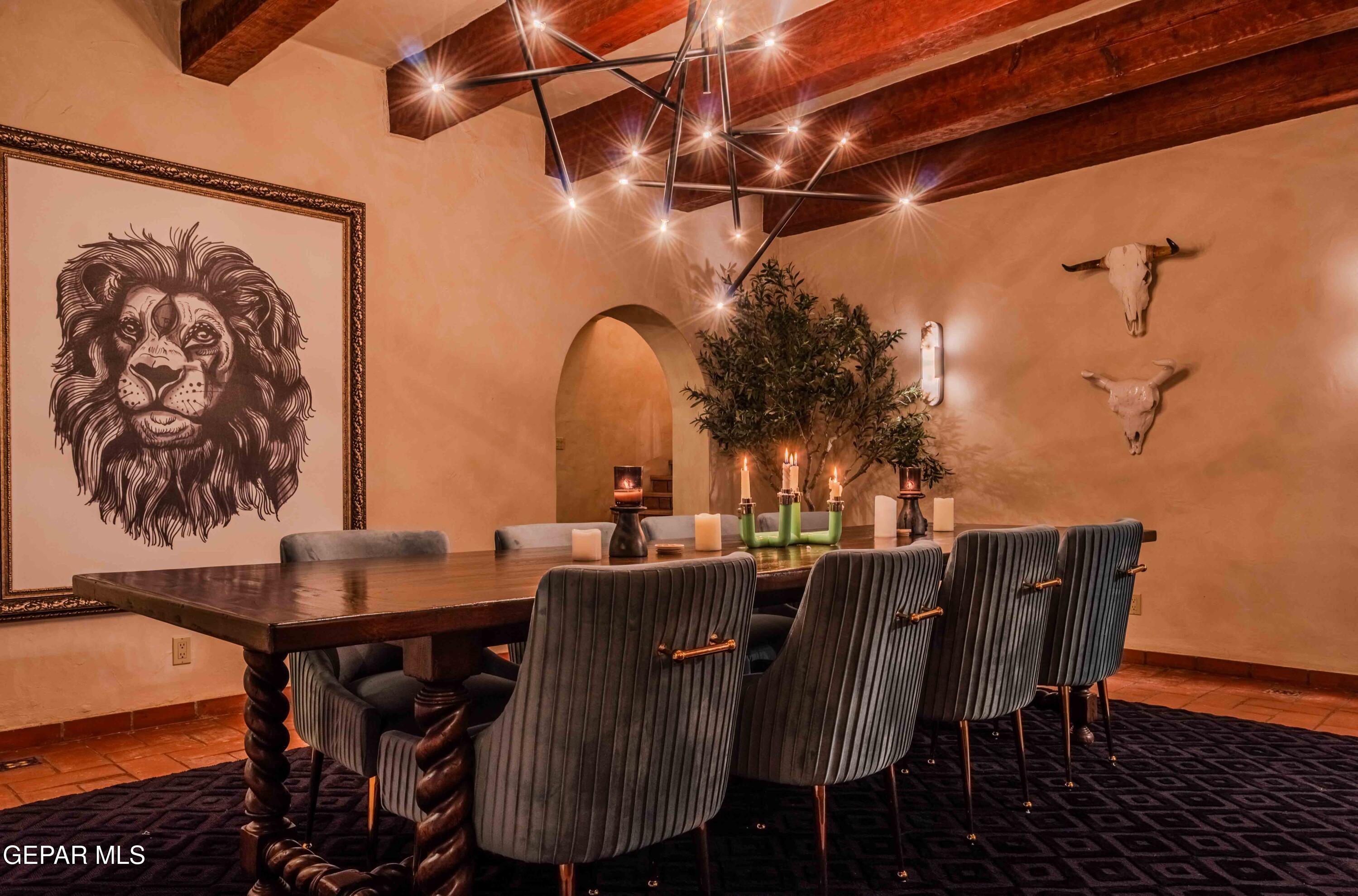 701 Rim Road El Paso, TX 79968 - Photo 24 of 54 a view of a dining room with furniture and wooden floor