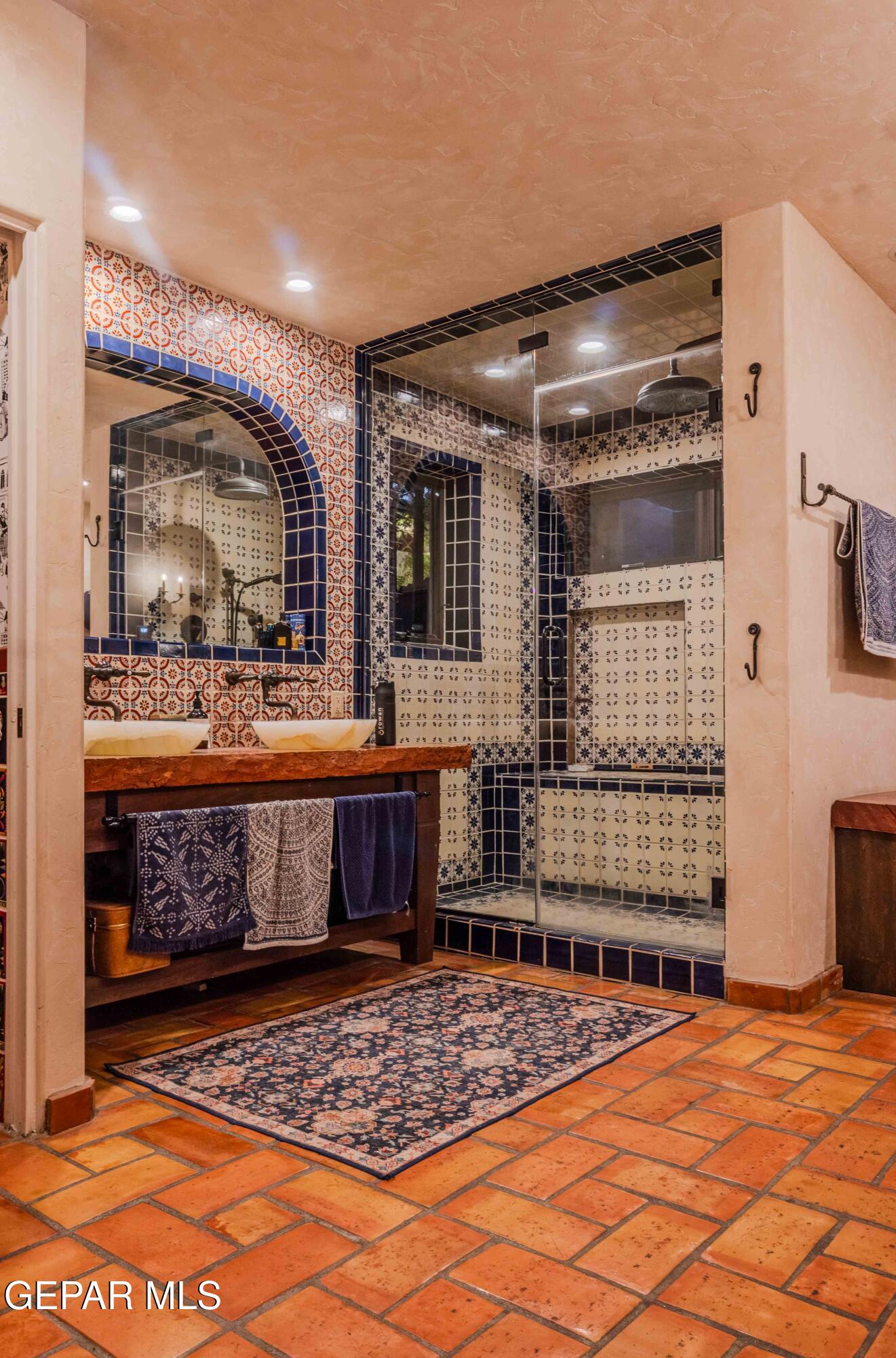 701 Rim Road El Paso, TX 79968 - Photo 26 of 54 a living room with stainless steel appliances kitchen island granite countertop a sink and cabinets