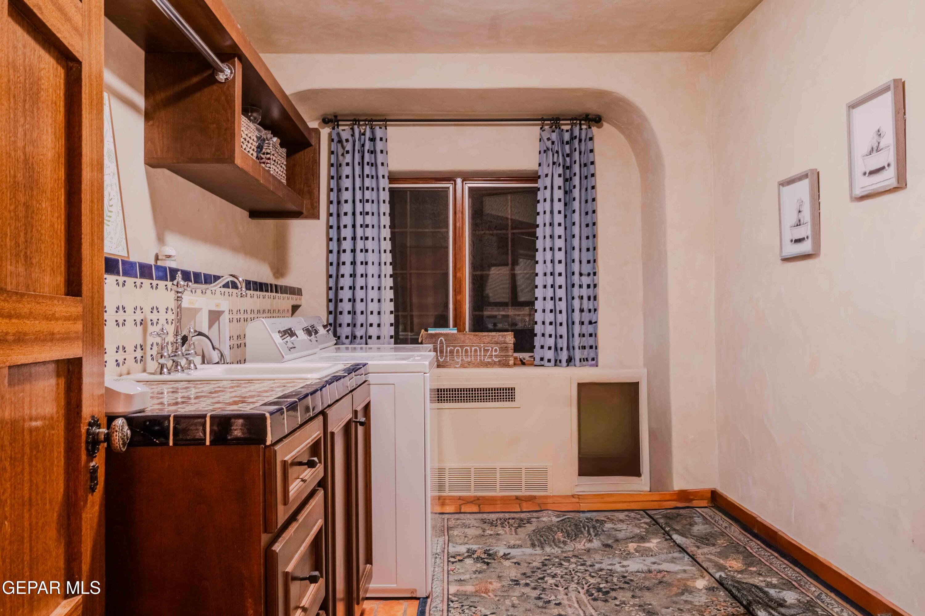 701 Rim Road El Paso, TX 79968 - Photo 34 of 54 a view of living room with granite countertop furniture and a fireplace