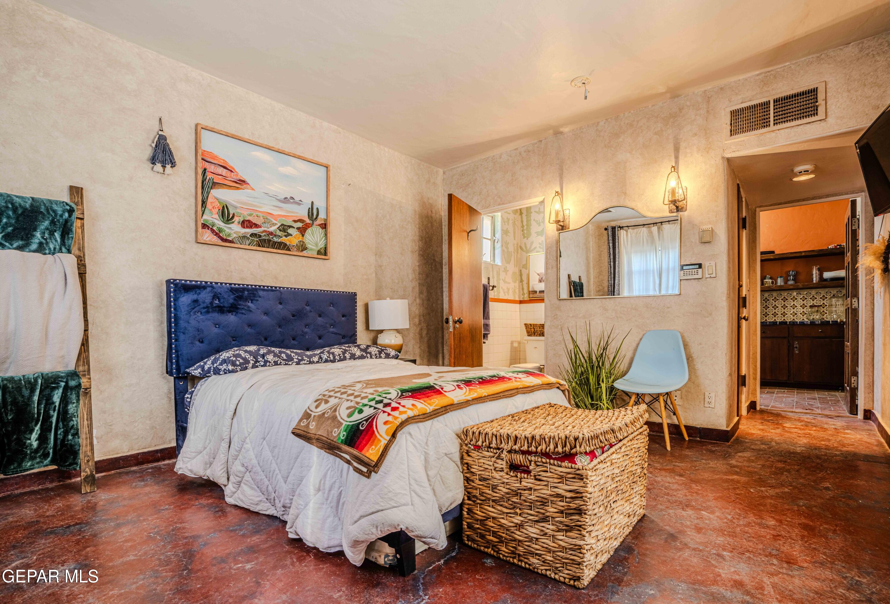 701 Rim Road El Paso, TX 79968 - Photo 40 of 54 a bedroom with a bed and glass windows