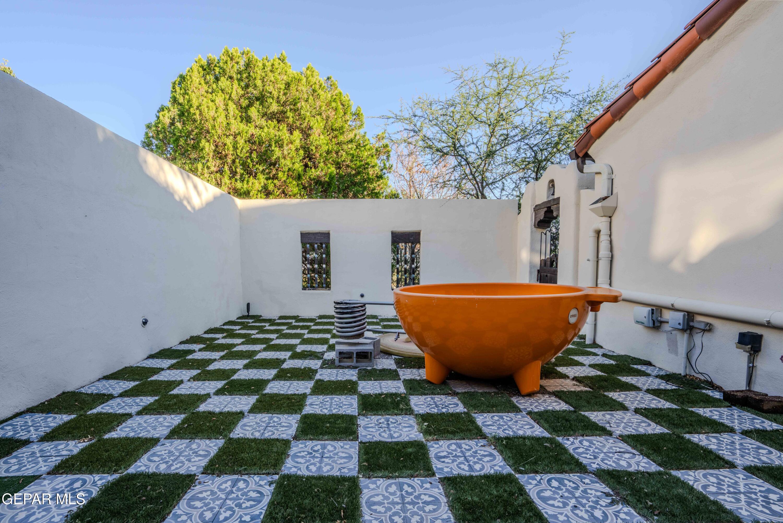 701 Rim Road El Paso, TX 79968 - Photo 42 of 54 a view of a small pool with yard