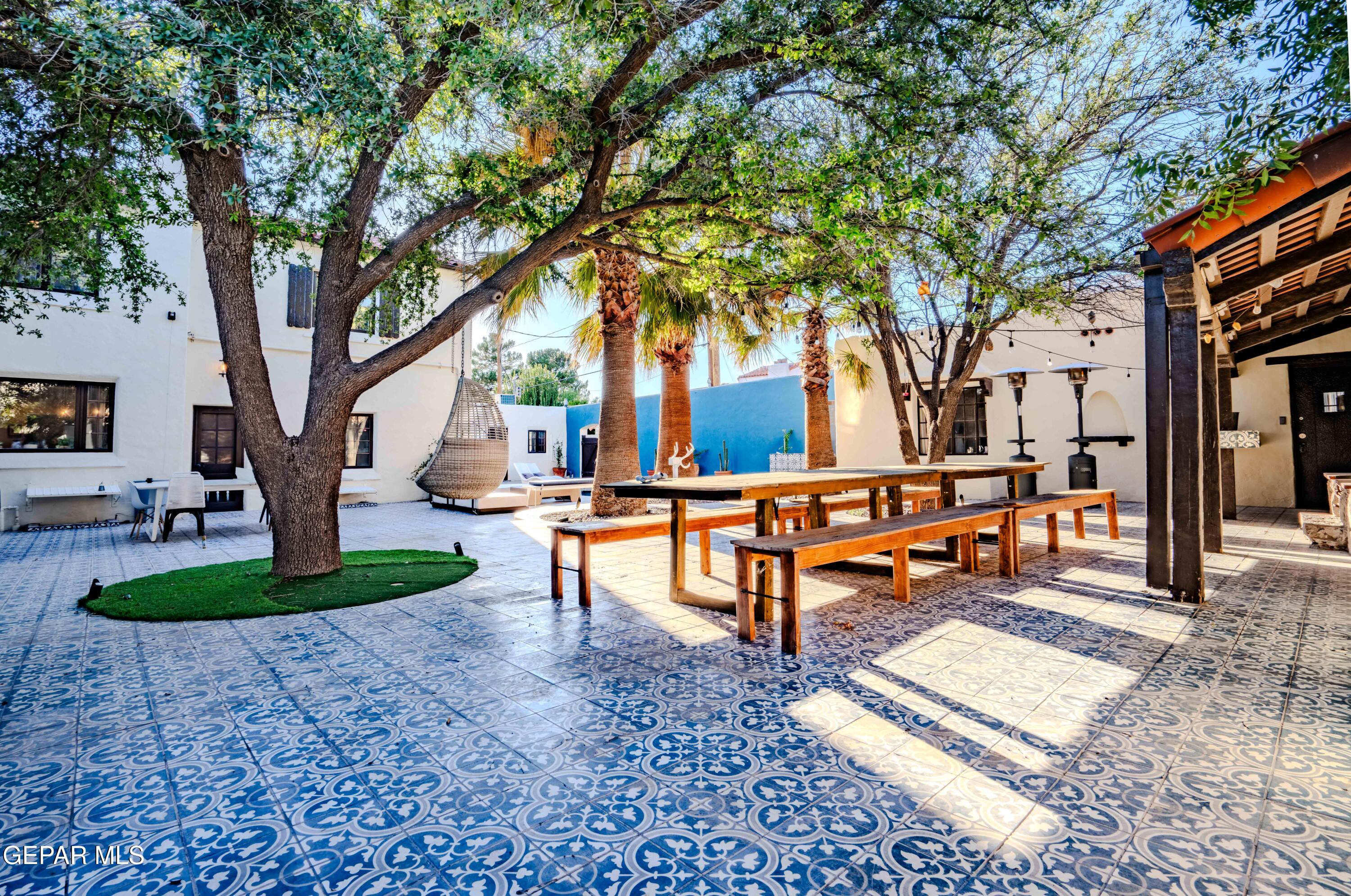 701 Rim Road El Paso, TX 79968 - Photo 43 of 54 a park view with bench and trees