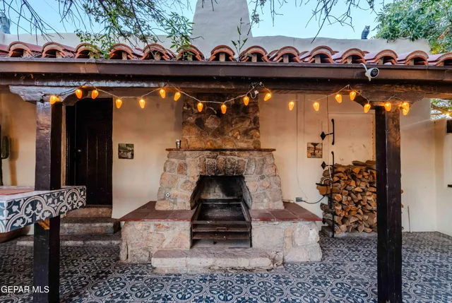 a lobby with furniture and stairs