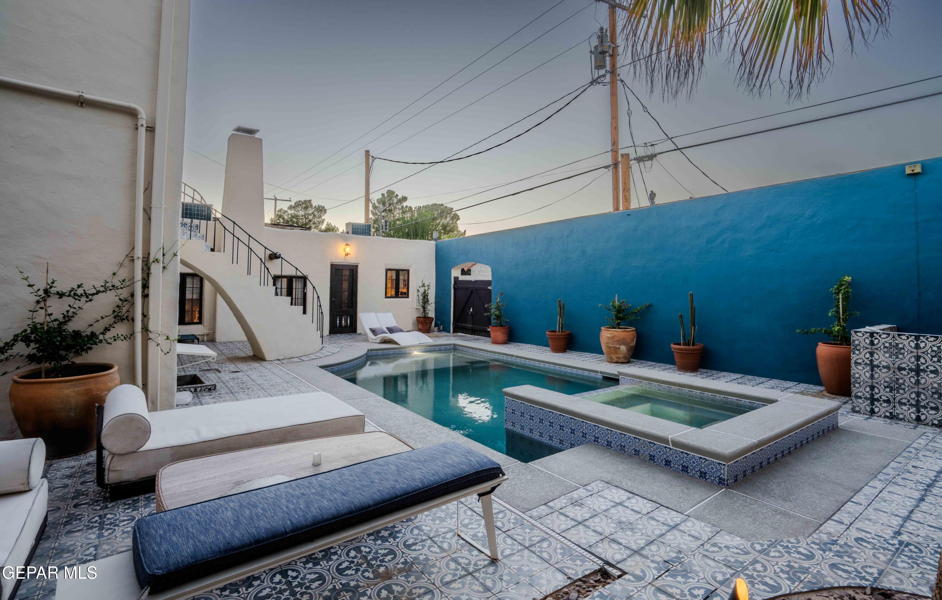701 Rim Road El Paso, TX 79968 - Photo 49 of 54 a living room with furniture and a potted plant