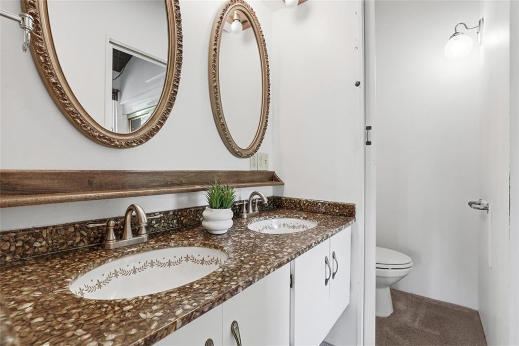 134 Meredith Drive Mars, PA 16046 - Photo 29 of 46 a bathroom with a granite countertop double vanity and a mirror