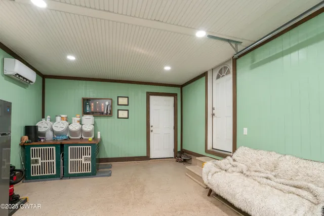 a bedroom with a bed and furniture