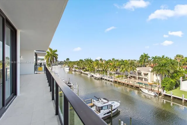 a view of a balcony with chairs