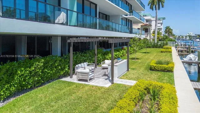 a view of a hallway with wooden floor and doors