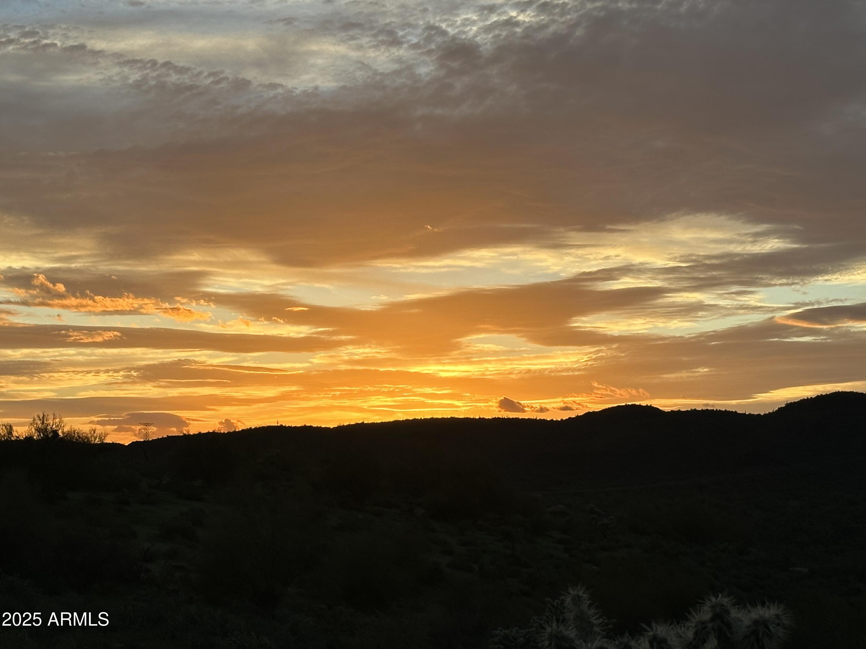 0 North Angel Basin Road, Unit 4 Gold Canyon, AZ 85118 - Photo 4 of 9 a view of an ocean and beach