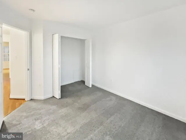 an empty room with closet