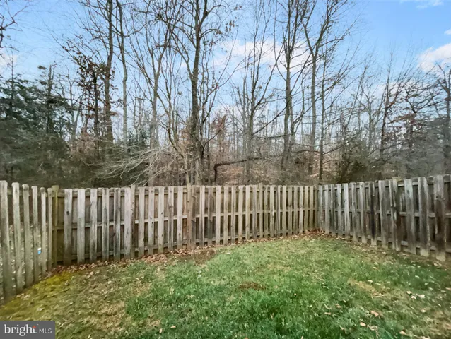 a view of a wooden fence