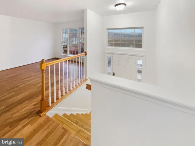 a view of entryway with wooden floor