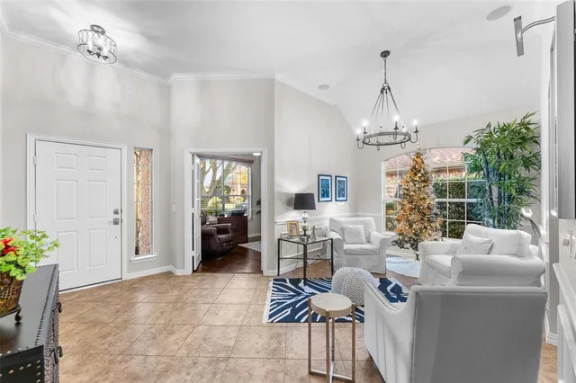a view of a livingroom with furniture and window