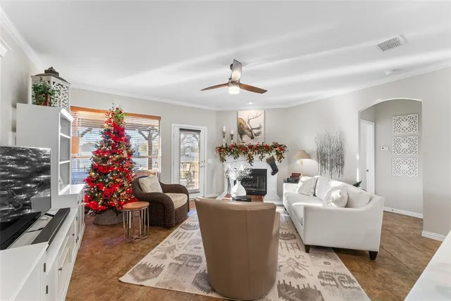 a living room with furniture window and couch