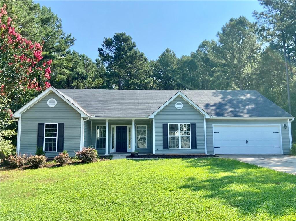 1437 Apalachee Falls Road Monroe, GA 30656 - Photo 1 of 1 a view of a house with a yard and potted plants