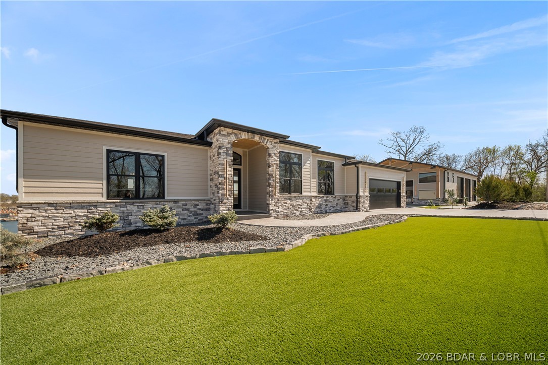 1356 Duckhead Road Lake Ozark, MO 65049 - Photo 4 of 99 Spacious + Flat Front Yard