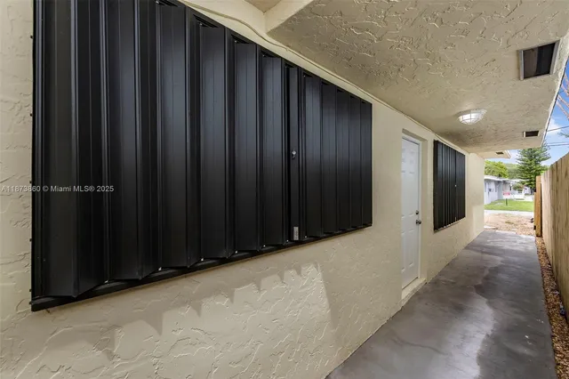 a car parked in front of a house