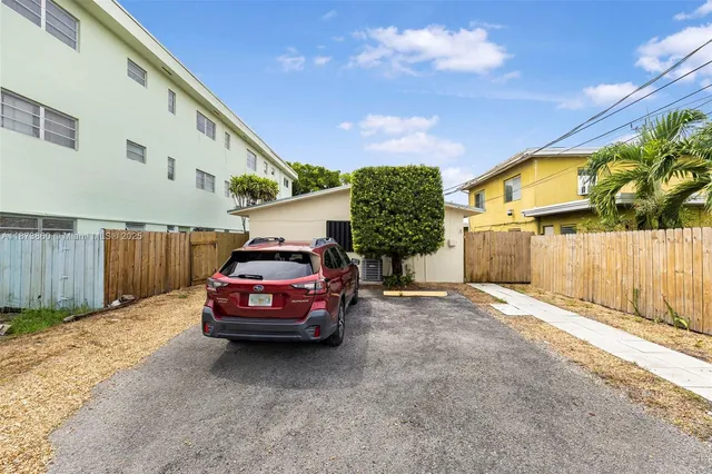 a view of kitchen with wooden floor