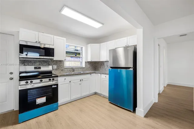 a view of a room with racks on the wall