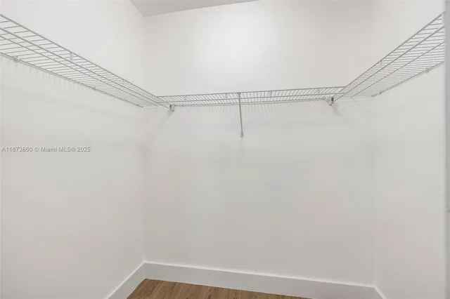 a aerial view of multiple house with outdoor space