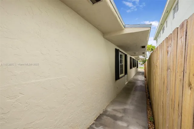 a house view with a backyard space