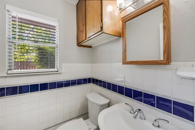 a bathroom with a sink and a bathtub