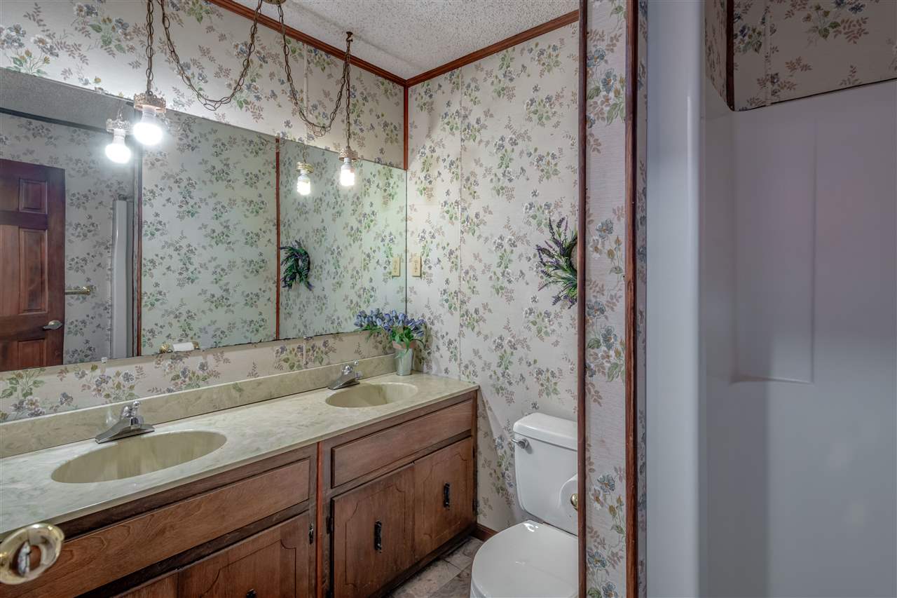 5230 Bateman Road Millington, TN 38053 - Photo 13 of 22 Downstairs shared bath w/ double vanities and shower only.