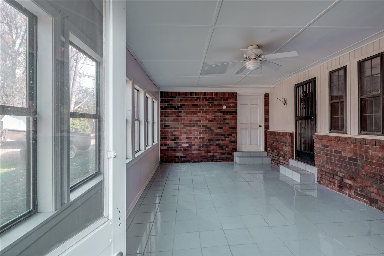 5230 Bateman Road Millington, TN 38053 - Photo 15 of 22 Tiled floor, ceiling fan, looking out to the grounds