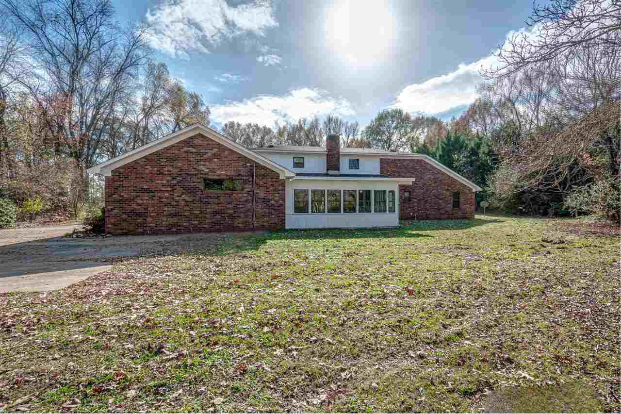 5230 Bateman Road Millington, TN 38053 - Photo 19 of 22 Large backyard, big enough for a pool or any outdoor activity. Septic lines are on side of home and have just recently been cleaned out.