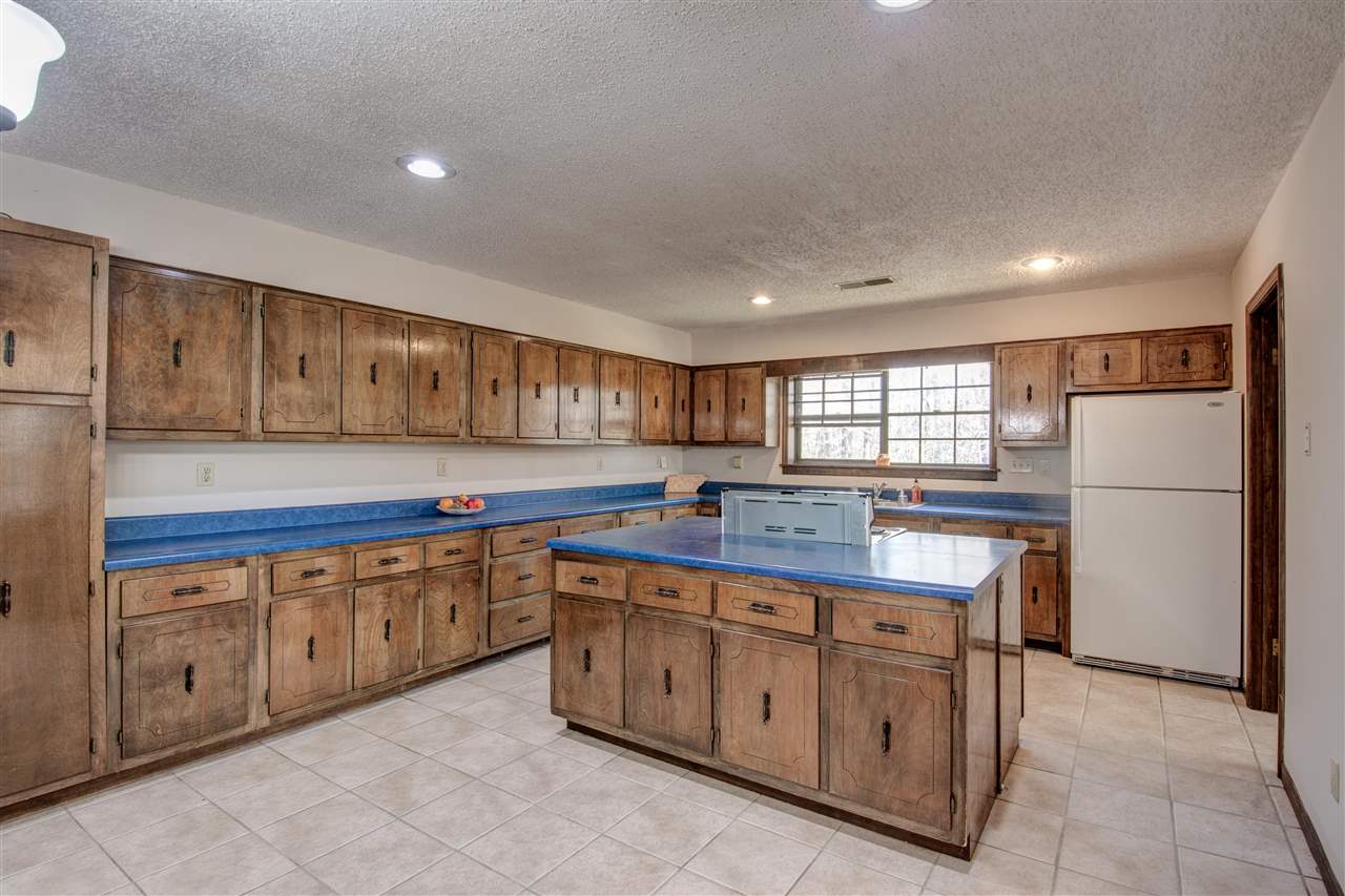 Did you know that BLUE is the most common favorite color? Whether you like blue or not, this kitchen is very spacious and with lots of cabinets. Tons of counter top space for prepping food and family gatherings.