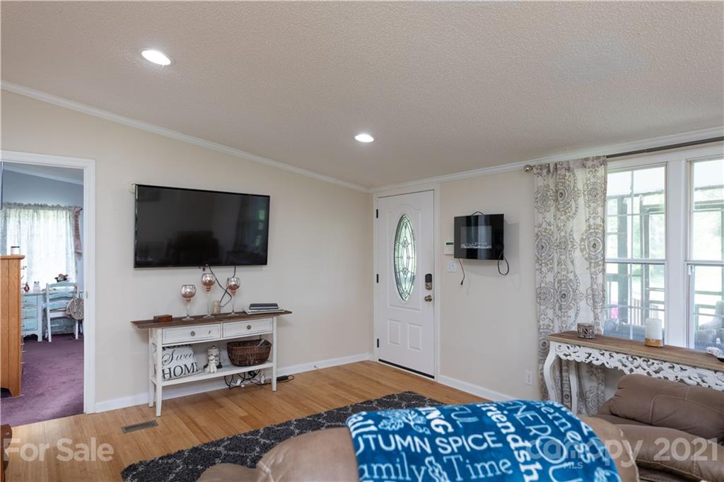 2841 Hart Road Clover, SC 29710 - Photo 12 of 26 a bedroom with furniture and a flat screen tv