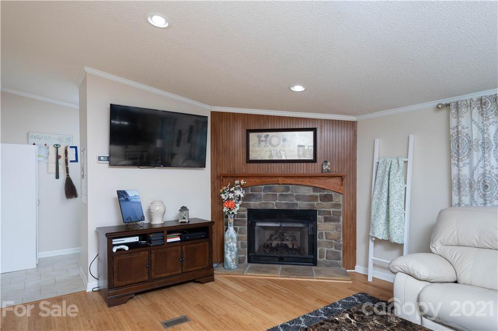 2841 Hart Road Clover, SC 29710 - Photo 20 of 26 a living room with furniture and a fireplace