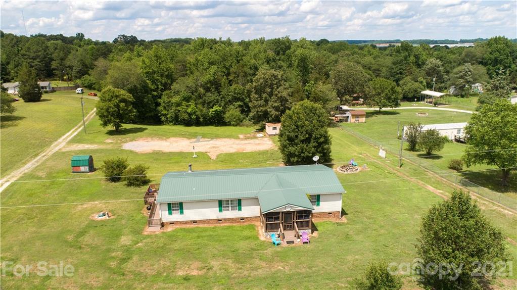 2841 Hart Road Clover, SC 29710 - Photo 25 of 26 a view of a swimming pool with a yard
