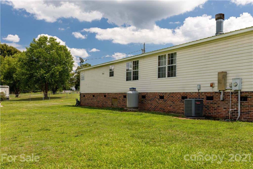 2841 Hart Road Clover, SC 29710 - Photo 6 of 26 a view of a house with a backyard