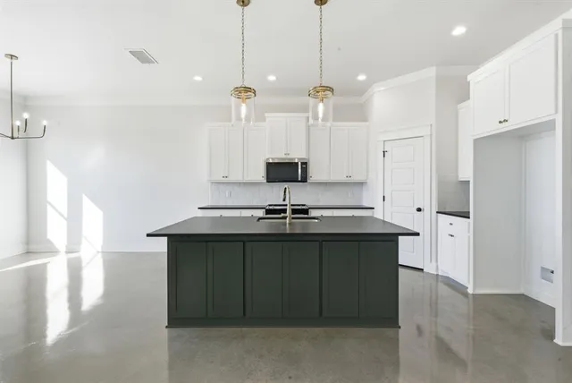 a bathroom with a sink and a shower