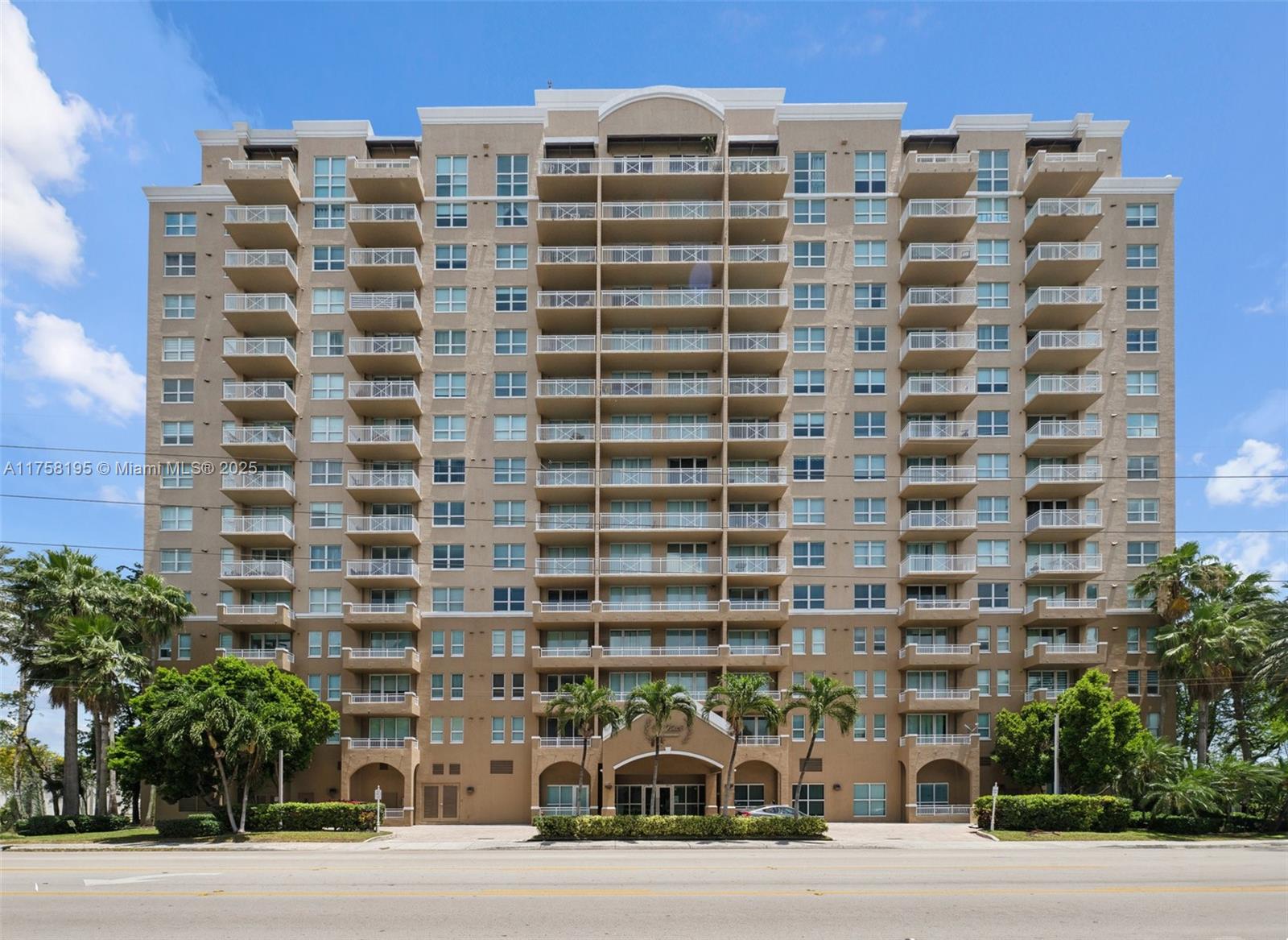 a tall building sitting on the side of a street
