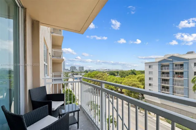 a view of balcony with furniture