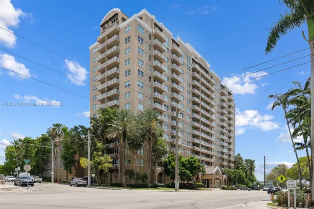 a tall building sitting on the side of a street