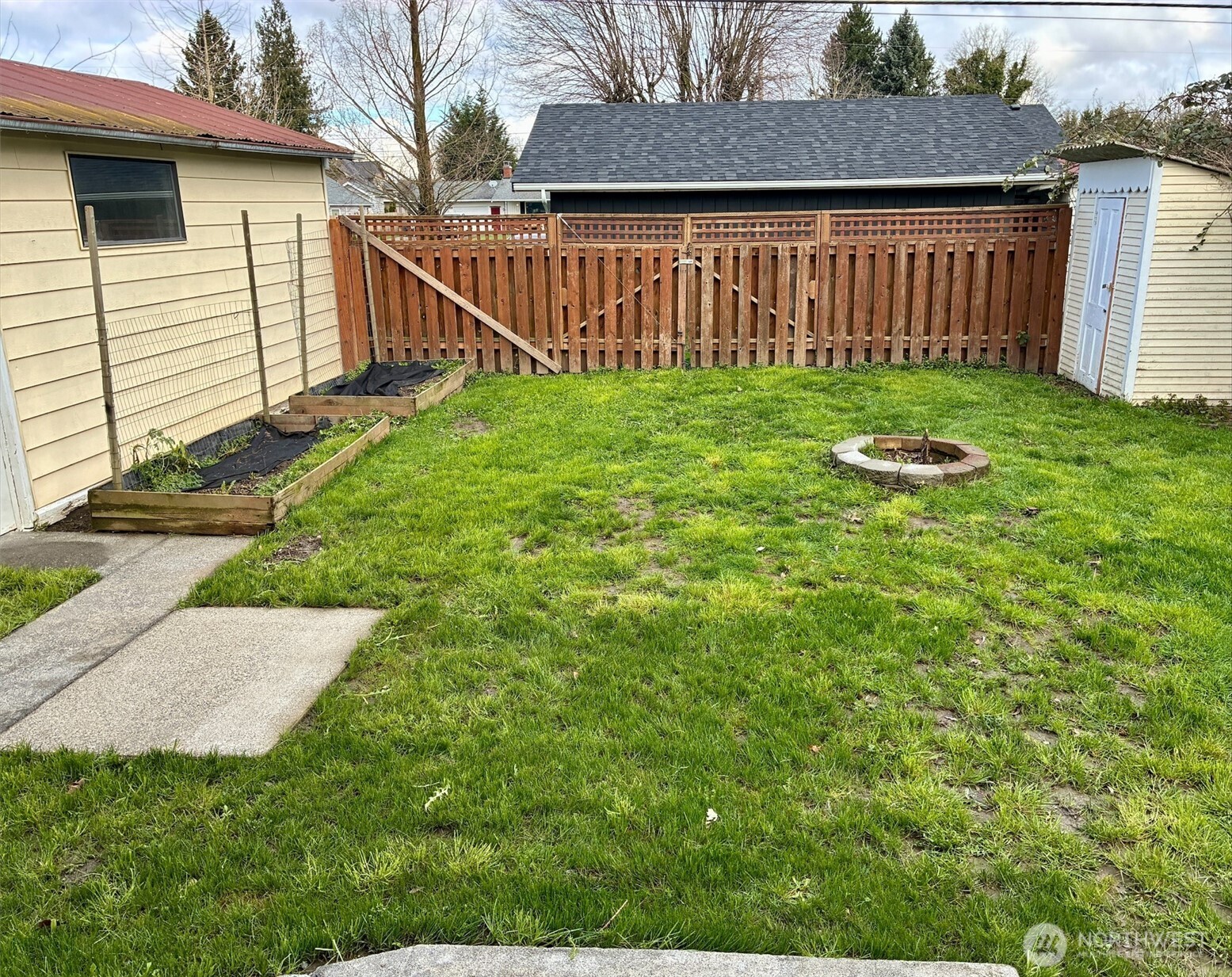 310 Second Street Sumas, WA 98295 - Photo 23 of 26 a view of a house with backyard and porch