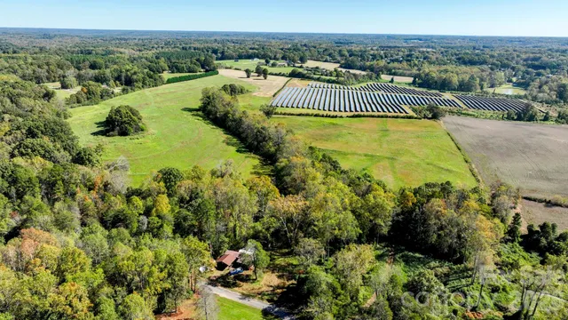 a view of a balcony with an outdoor space and seating area
