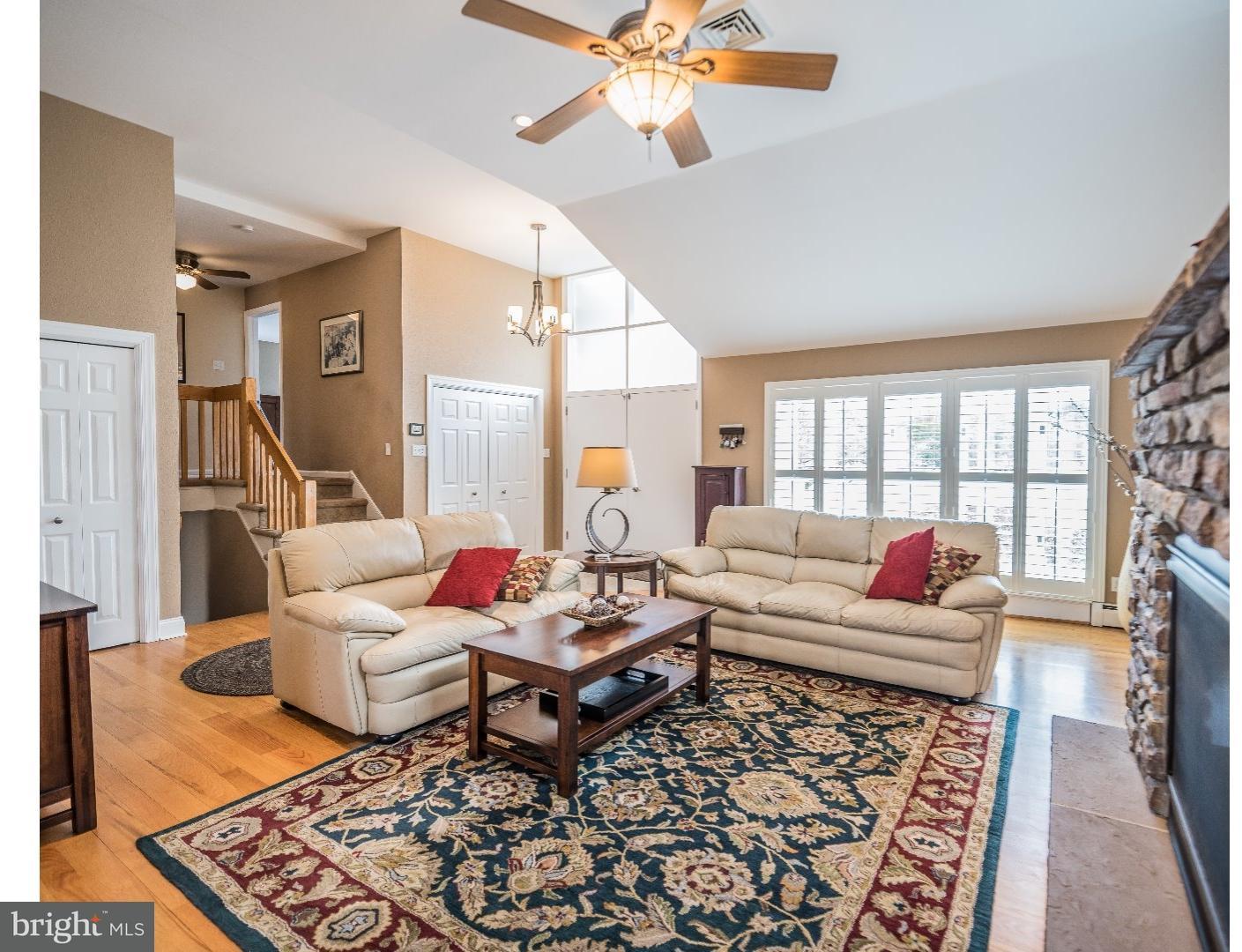 10 Doe Run Road Warrington, PA 18976 - Photo 1 of 7 a living room with furniture and a window
