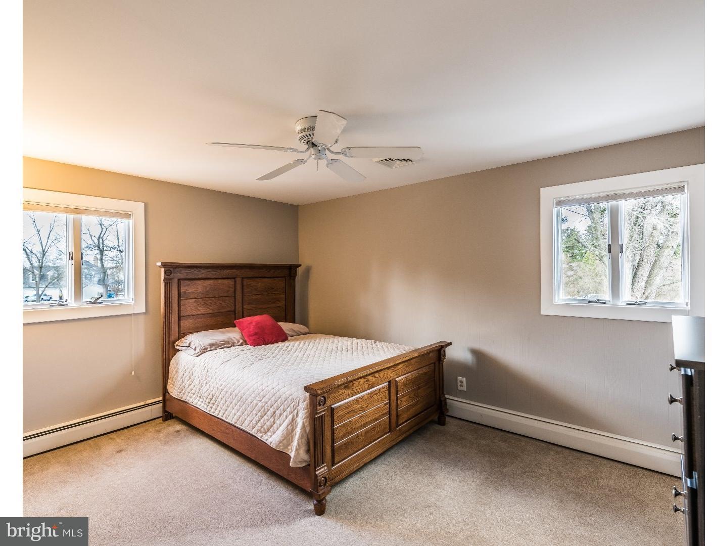10 Doe Run Road Warrington, PA 18976 - Photo 5 of 7 a bedroom with a bed and window