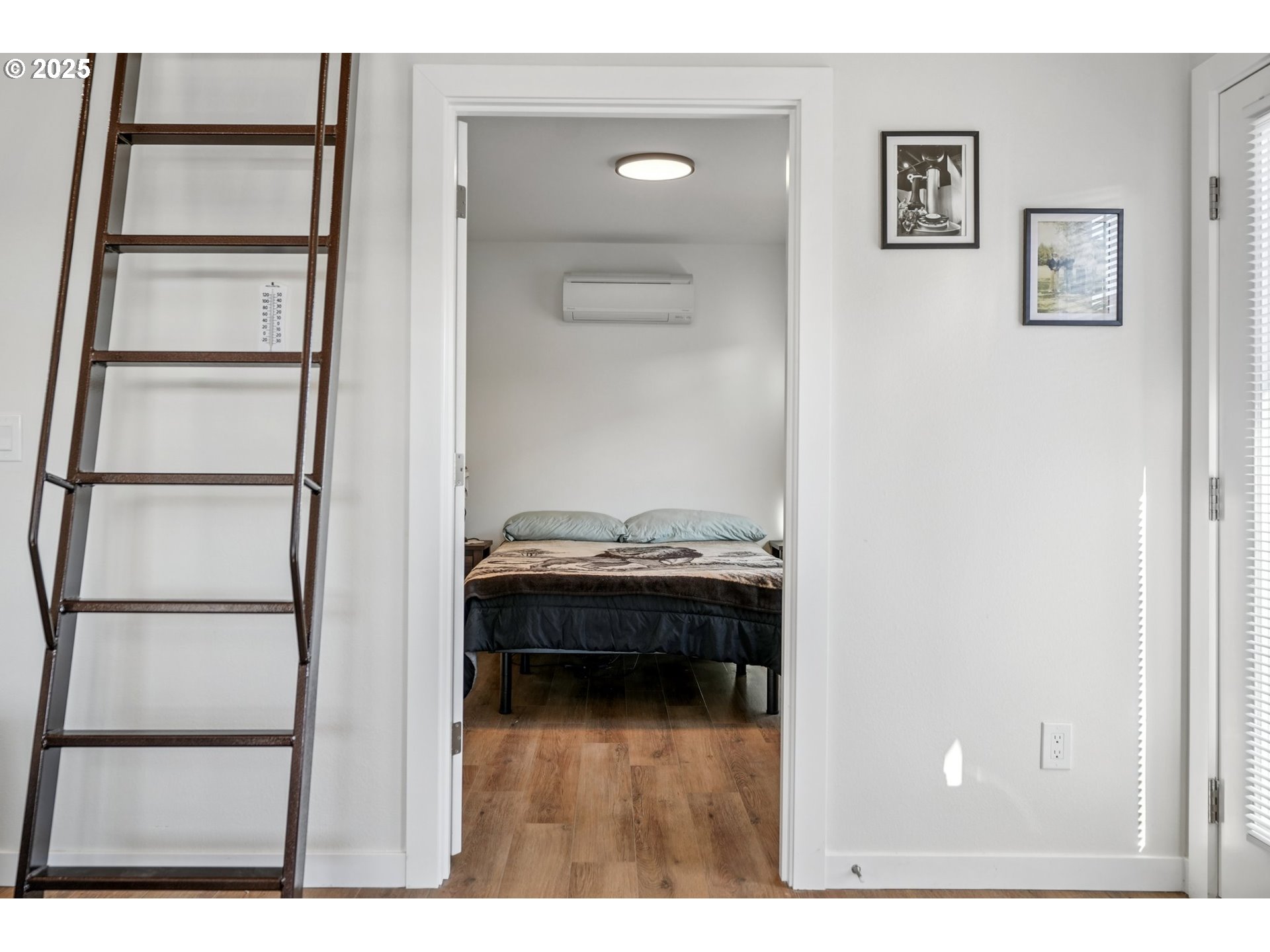 34326 Johnson's Landing Road, Unit E1 Scappoose, OR 97056 - Photo 11 of 21 a living room with a furniture and a window